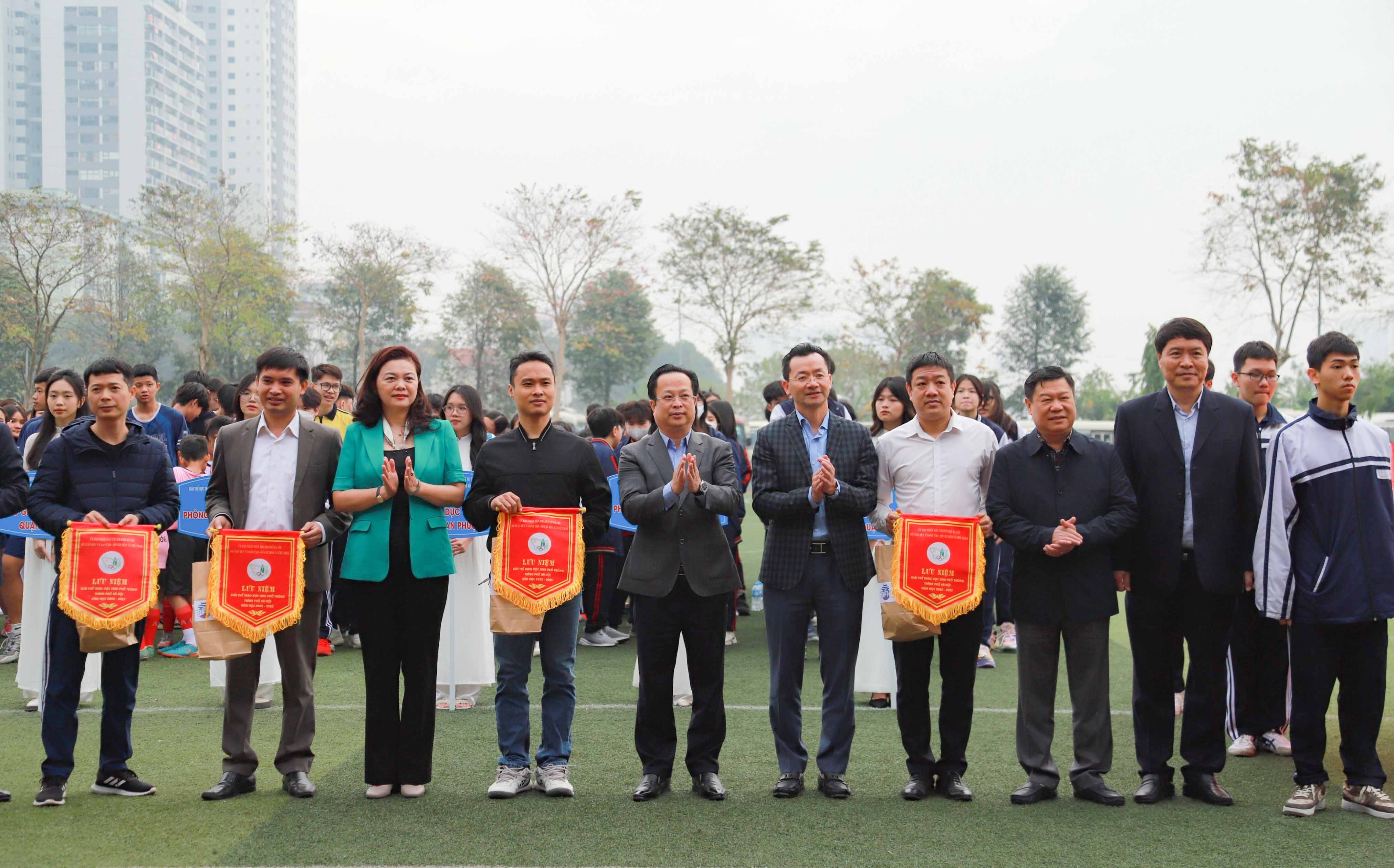 A group of people standing together outsideDescription automatically generated with medium confidence